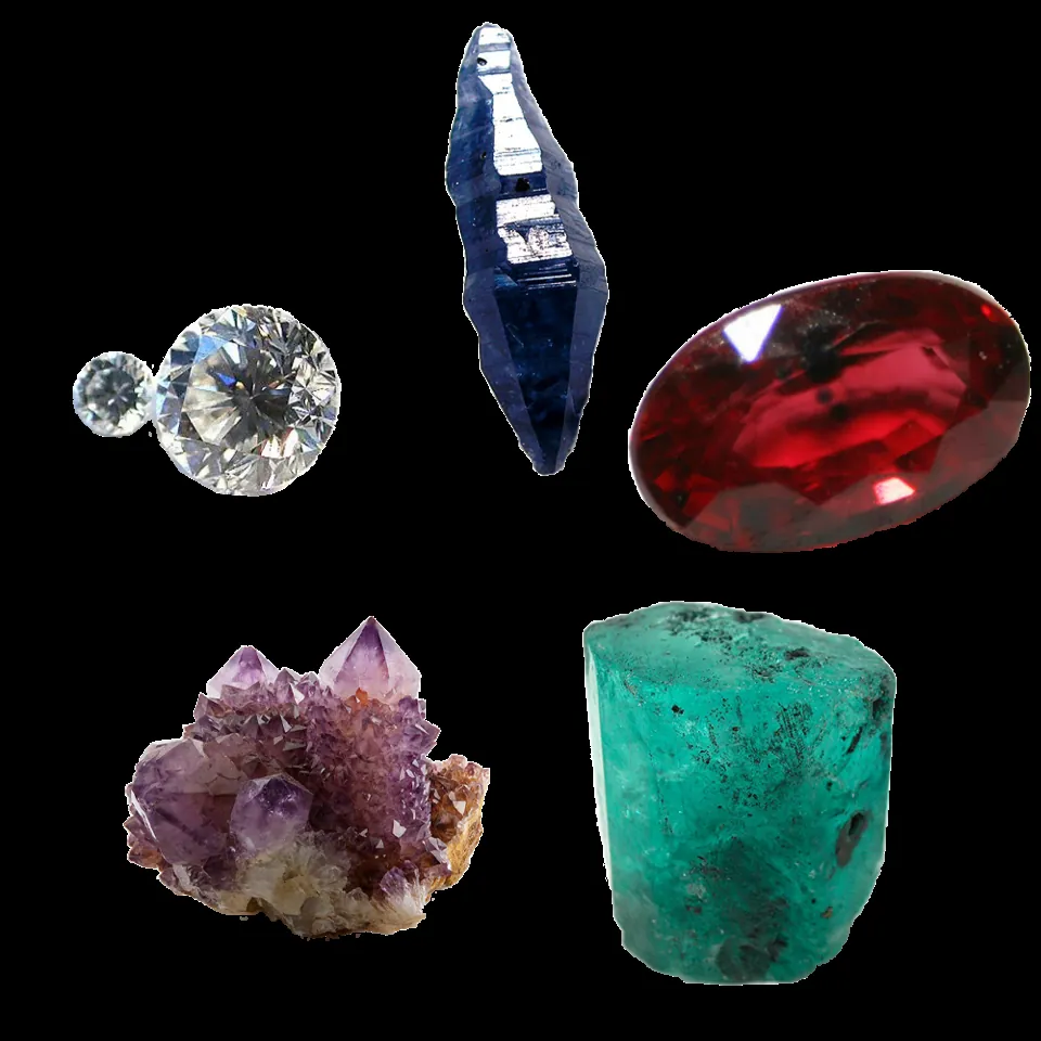 Sapphire, ruby, emerald, amethyst and diamond arranged together on a black background